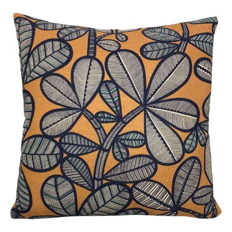 coussin motif feuilles jaune et noir